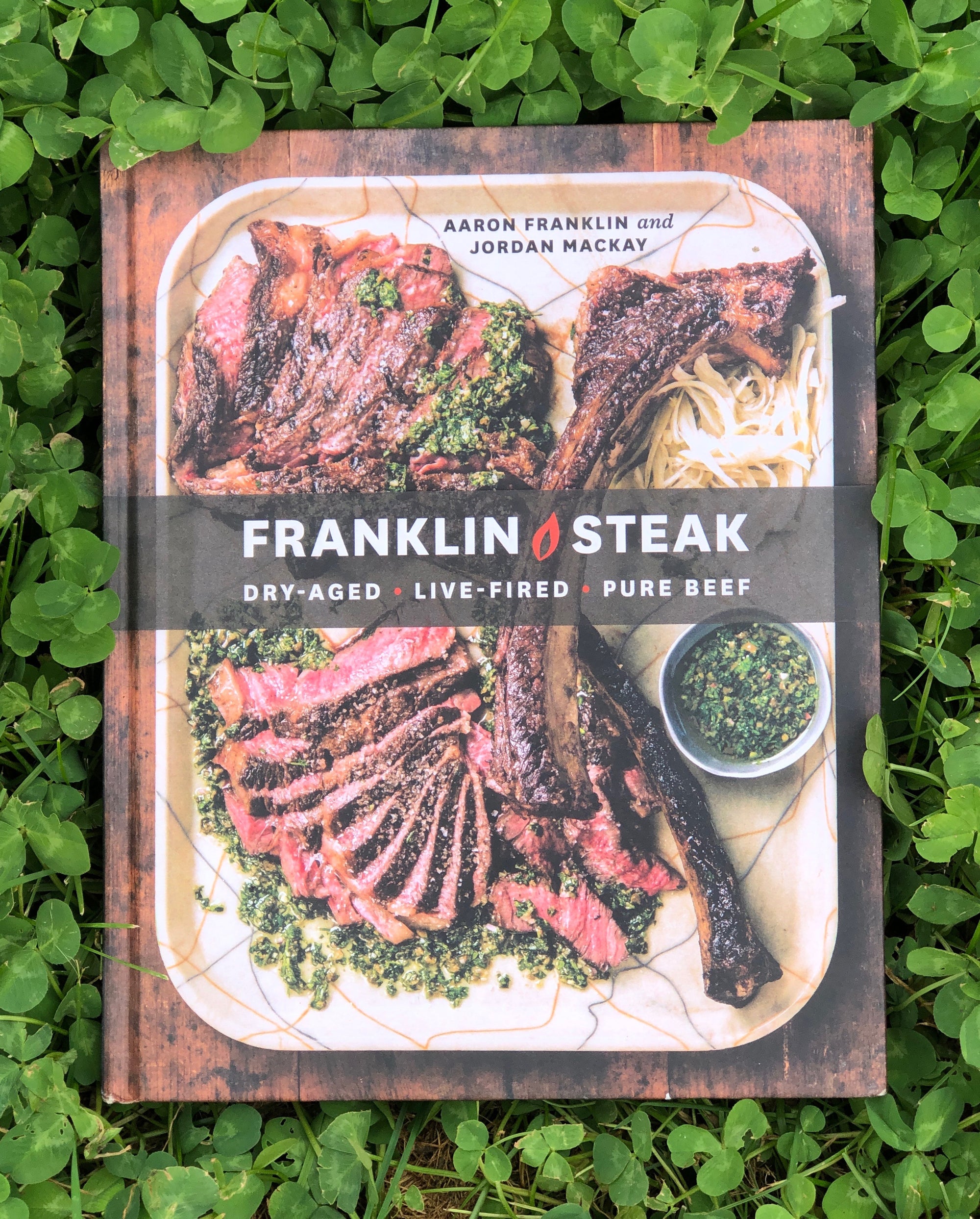 Franklin Steak book siting on leaves
