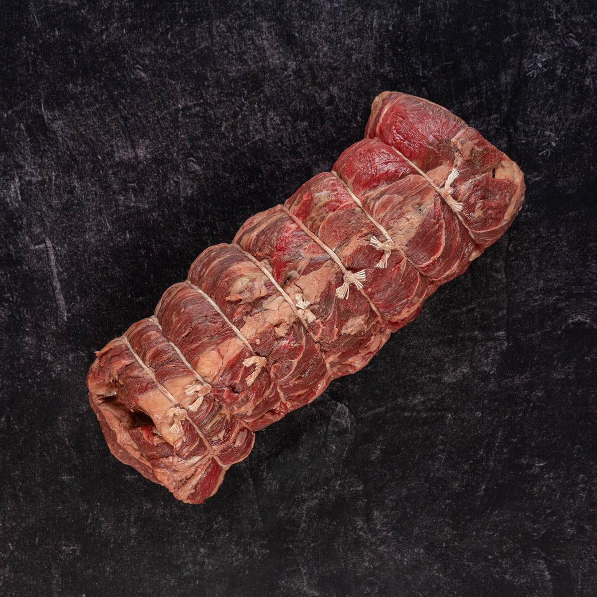 Whole Chuckeye Roast cut of beef on slab