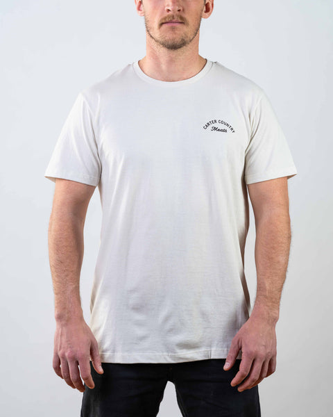 Front modeled view of white tee with Carter Country Meats printed on upper left chest area
