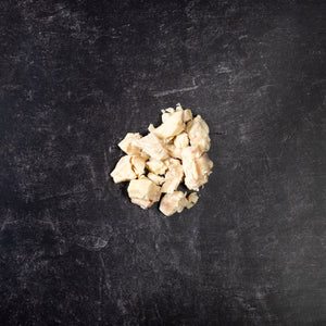 Small pile of light yellow beef kidney fat on slab